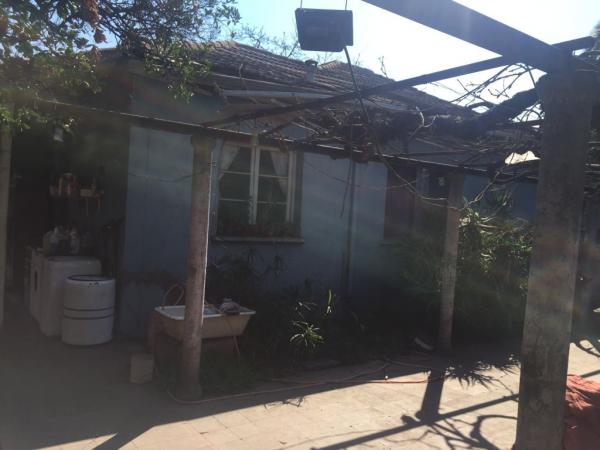 SE VENDE TERRENO CON CASA