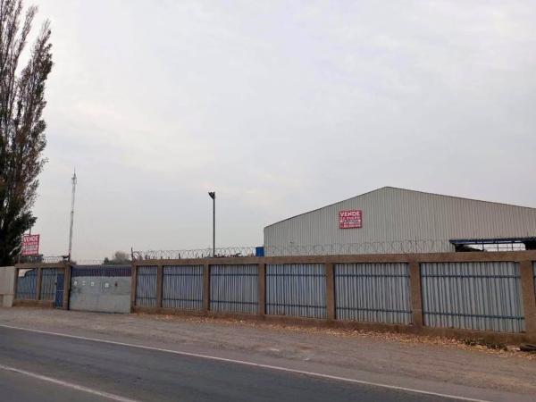 VENTA DE PROPIEDAD TERRENO Y 3 GALPONES.