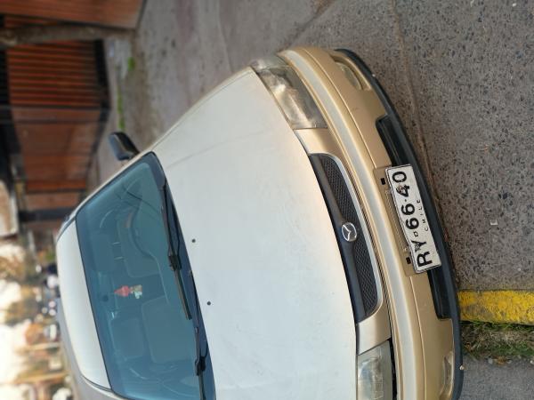 TENGO UN MAZDA ARTIS GLX IMPECABLE DE MOTOR Y CAJA