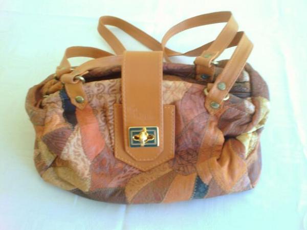 CARTERA DAMA