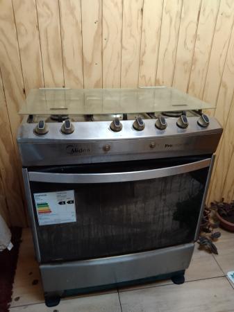 VENDO COCINA MIDEA 5 PLATOS